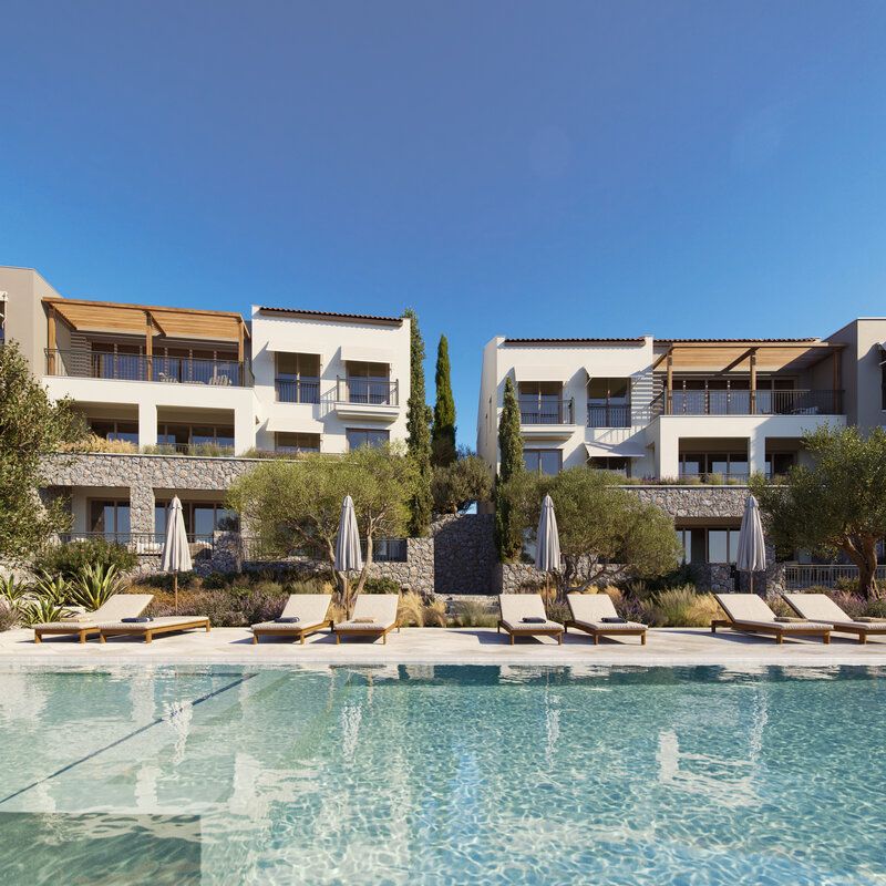 Botanika Apartments poolside with stone facades